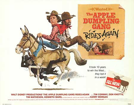 A joyful family watching The Apple Dumpling Gang together on movie night.