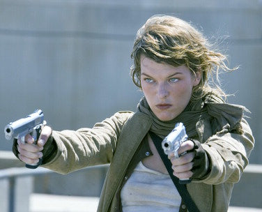 Milla Jovovich in a stunning photoshoot outfit showcasing her iconic style.