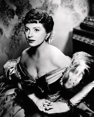 Deborah Kerr in a classic film scene showcasing her dramatic talent.