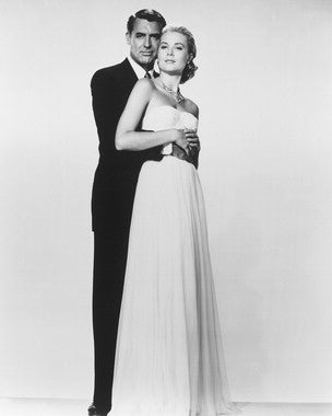 Cover of To Catch a Thief DVD showcasing Cary Grant and Grace Kelly in a thrilling scene.