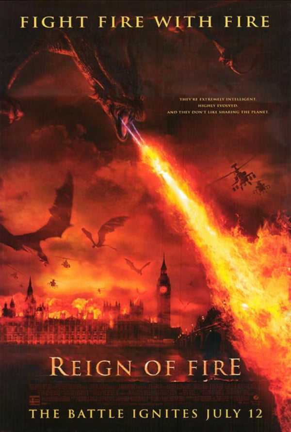 Epic battle scene from Reign of Fire showing a dragon and a warrior in combat.
