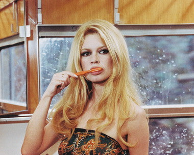 Close-up of Bardot inspired sunglasses on a stylish table