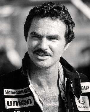 Close-up of a Burt Reynolds poster for home decor