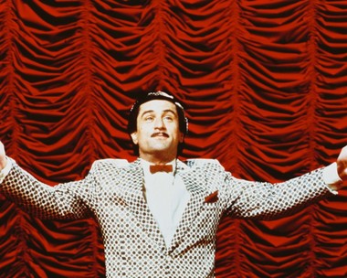 Close-up of Robert De Niro King of Comedy poster with vibrant colors