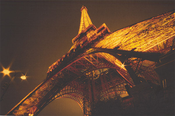 Eiffel Tower replica displayed on a shelf, showcasing intricate details.
