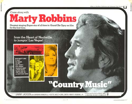 Country music albums displayed on a wooden table with vibrant cover art