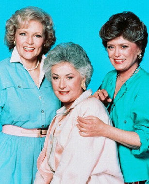 Close-up of a Betty White collectible figurine showcasing her iconic role in Golden Girls.