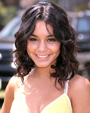 Vanessa Hudgens at a red carpet event showcasing her best fashion styles.