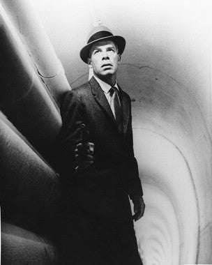 Poster of Lee Marvin in classic film, showcasing his dramatic role.