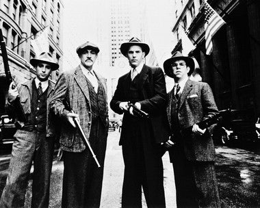 Kevin Costner's intense portrayal in Untouchables, depicting the 1930s Chicago crime scene.