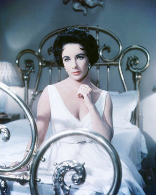 Classic movie poster showcasing Elizabeth Taylor in Cat on a Hot Tin Roof, ideal for film enthusiasts.