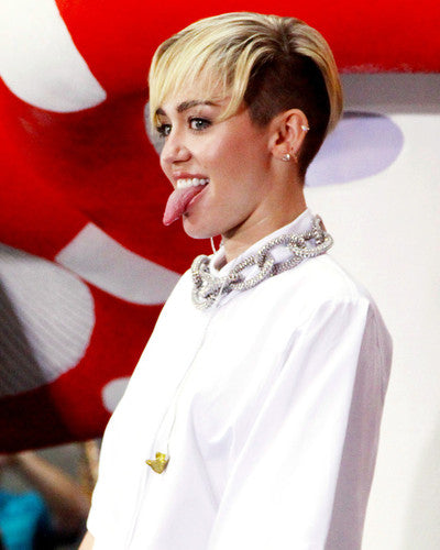 Miley Cyrus tour shirt featuring tour dates and signature style