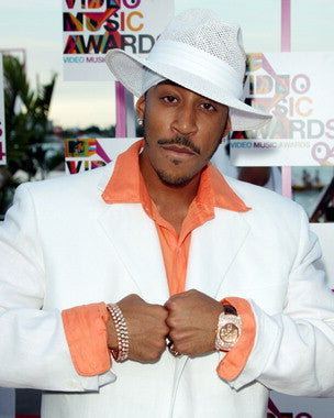 Ludacris performing live at a concert showcasing his latest album.