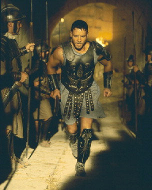 Russell Crowe in action scene from Gladiator, part of top Russell Crowe films to watch