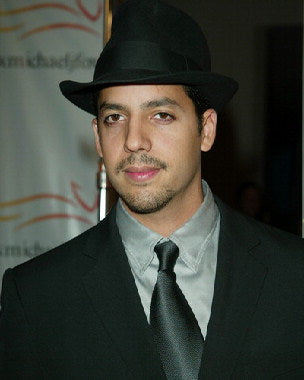 David Blaine performing a stunning magic trick at a live show.