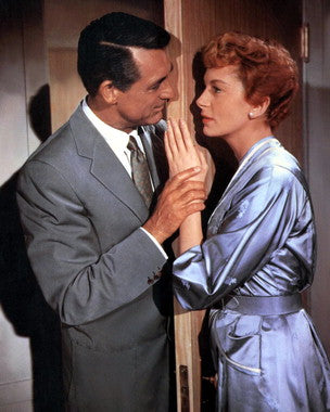 Cary Grant and Deborah Kerr sharing a romantic moment in Affair to Remember.