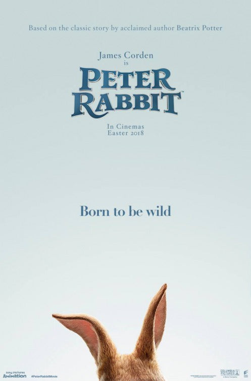 Charming Peter Rabbit gift set featuring books and a plush toy, perfect for babies.