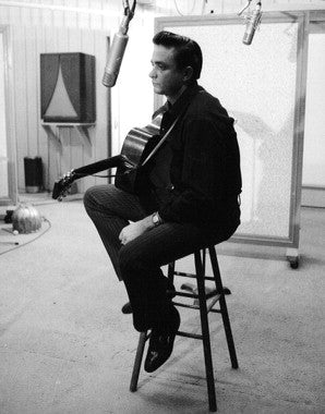 Close-up of Johnny Cash vinyl records showcasing classic album art.