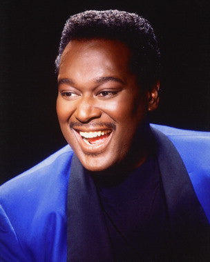 Close-up of Luther Vandross performing live, capturing his emotional delivery and R&B charm