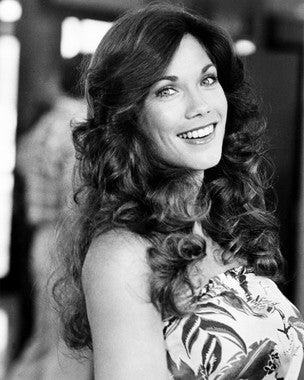 Barbi Benton skincare essentials displayed on a vanity for glowing skin